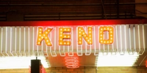 a neon sign with a word keno