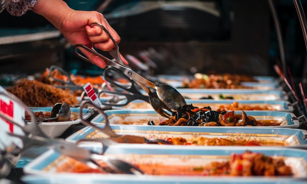 ulysse-pointcheval-a-8LxEvb4kU-unsplash (1) white hand reaching into buffet