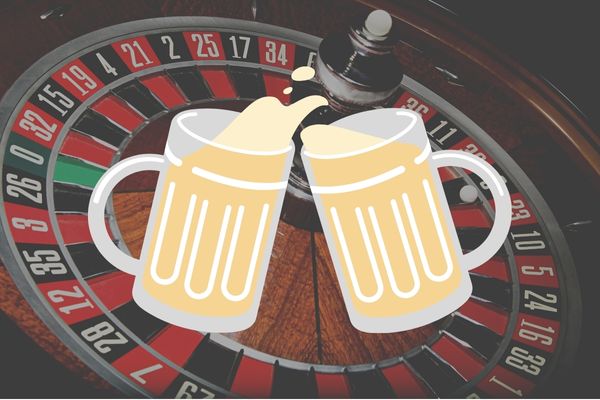 tall boy roulette with two beer glasses on a roulette table
