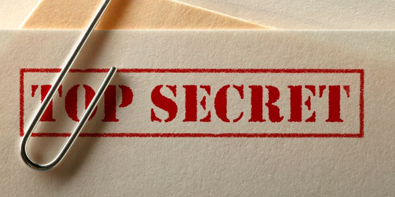 an envelope with a top secret stamp an envelope with a top secret stamp