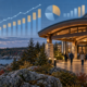 Editorial illustration of Maine casino revenue, a New England landscape, and monthly gaming data