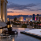 Editorial illustration of Nevada sports-betting enforcement, a courthouse, and a regulated casino skyline