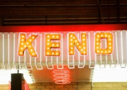 a neon sign with a word keno