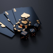 black and gold aces with three dice