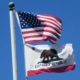 USA flag flying above California state flag