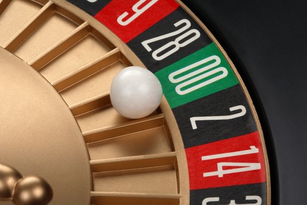 a close up view of the roulette table and white ball