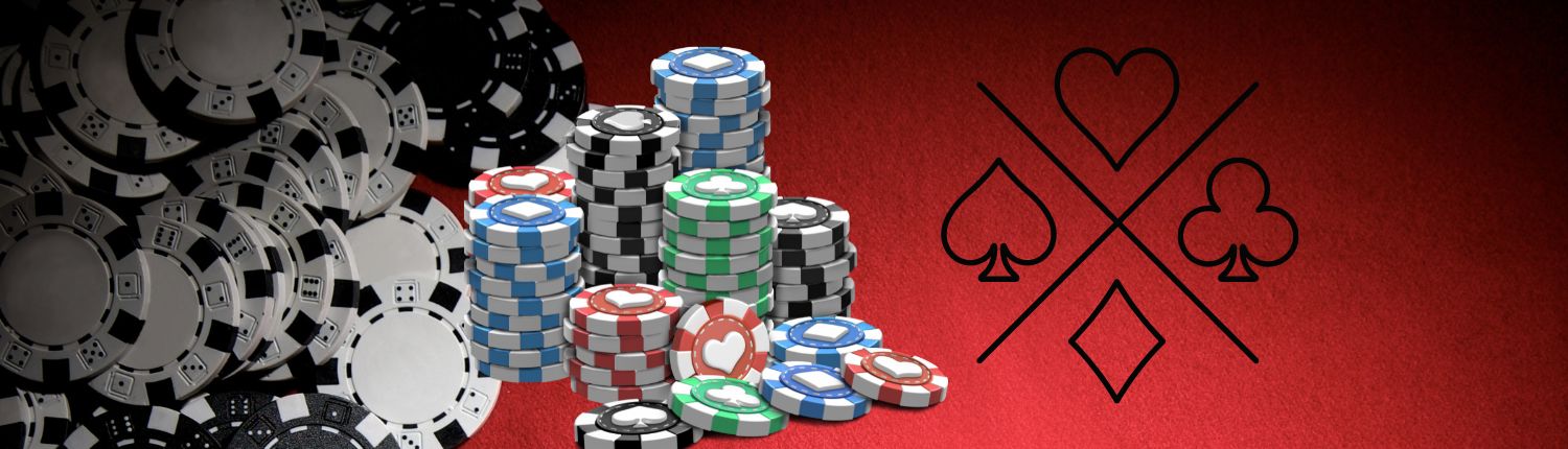 Stacked casino chips with ace, spade, clubs and diamond graphic