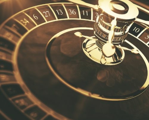 a golden roulette table spinning