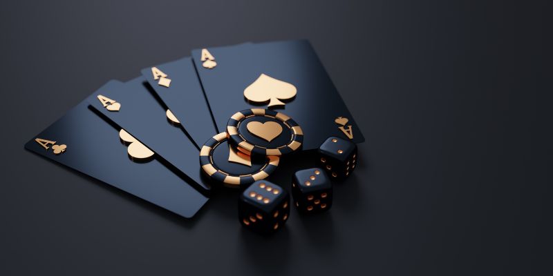 Black and gold aces, chips and dice